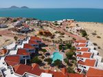 la hacienda condo 7 vacation rental - aerial view of swimming pool and beach 